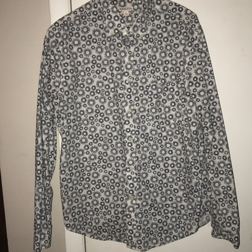 White button-up shirt with black designs.